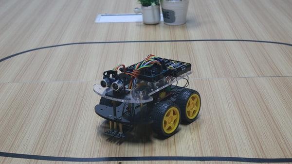 Conclusão da Etapa 4: Robô 4WD AD001 completamente montado com fiação e jumpers integrados